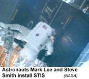 [image of first repair spacewalk]